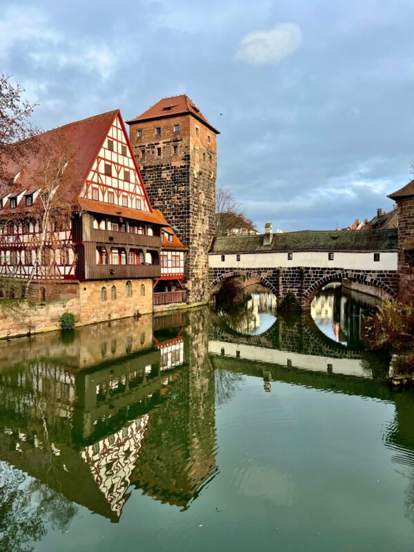 Is Nuremberg worth visiting? For this view over the halftimbered Wine Store and Hangman's bridge over the river Pegnitz in Nuremberg