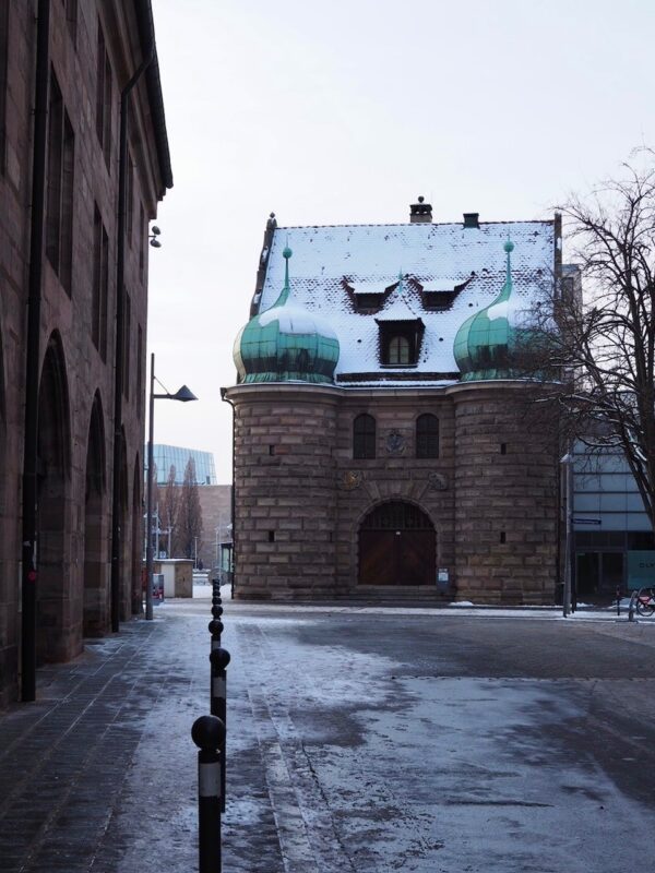 Snow dusts the twin onion domes of the former Imperial Armoury in Nuremberg