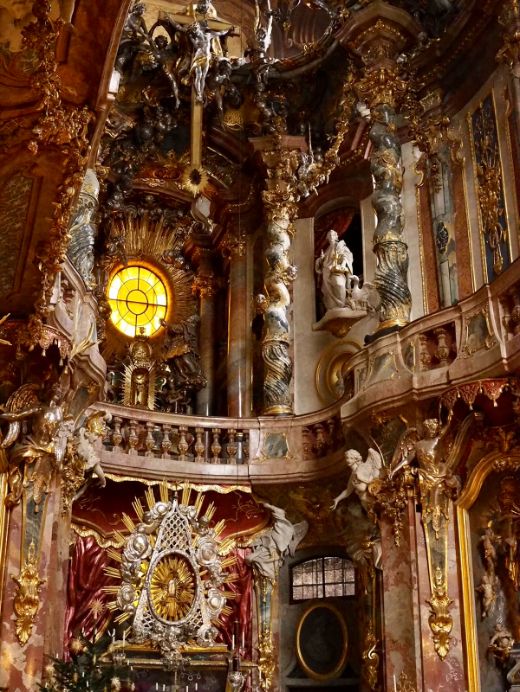 Rose pink marble and gilt furnishings adorn every square inch of the ornate Asamkirche, a highlight of your self guided walking tour of Munich