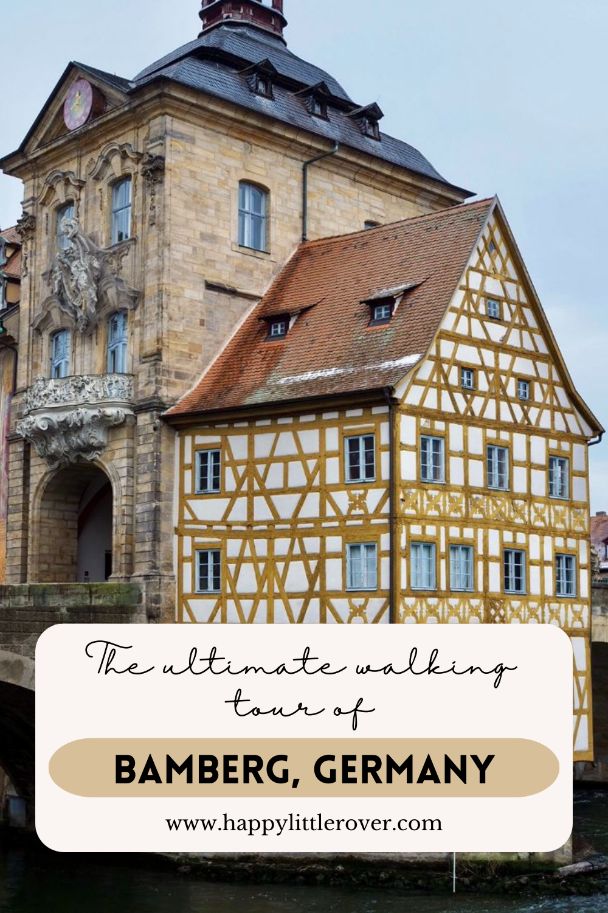 A pinterest pin showing a half-timbered house attached to a town hall, for the article on the ultimate walking tour & map of Bamberg, Germany